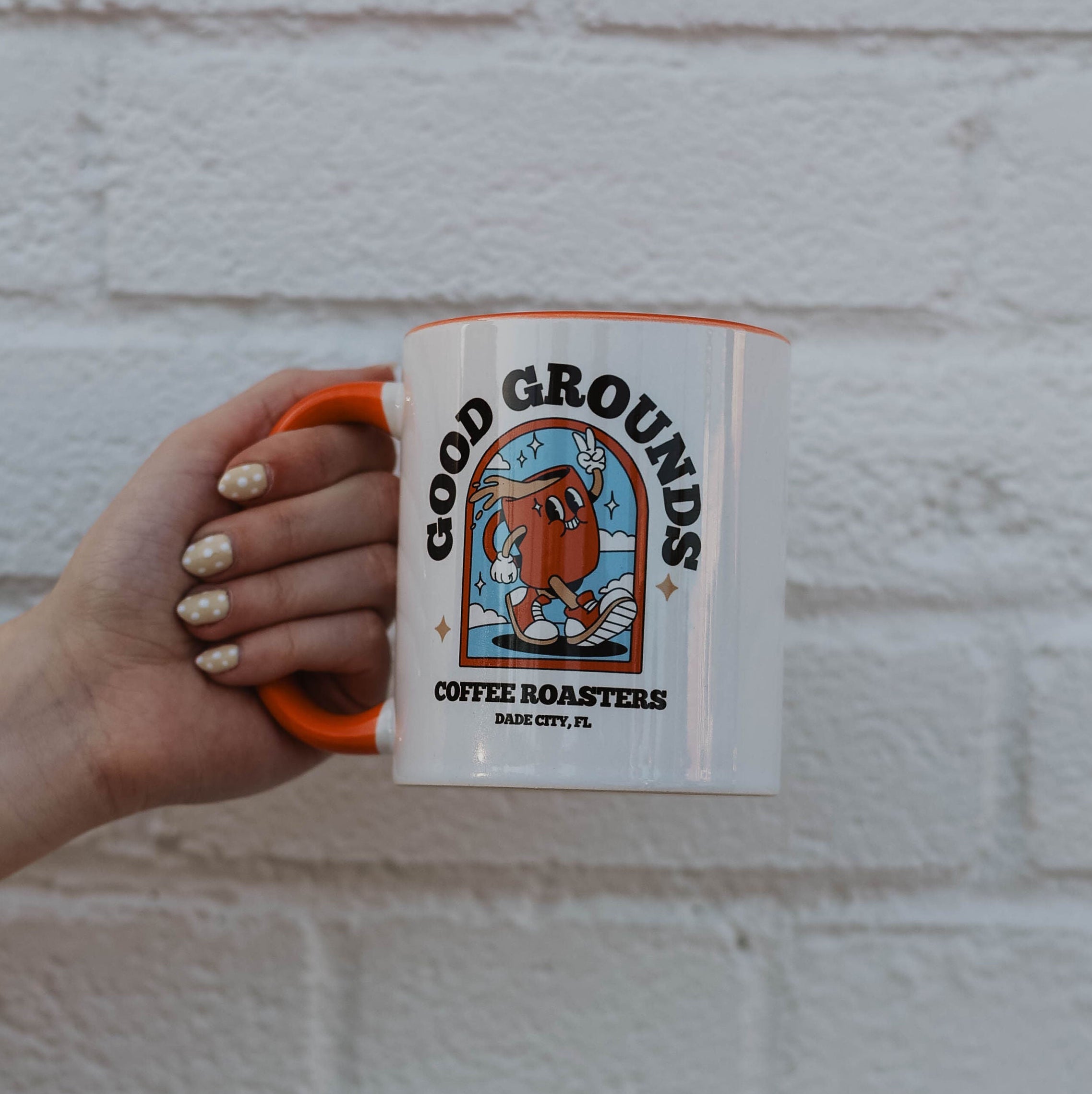 Good Grounds Coffee Roasters Dade City Florida Land'o'lakes Wesley Chapel Zephyrhills Lutz Mug Front against Wall